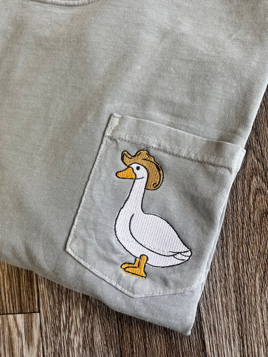 Cowboy Goose Embroidered Pocket Tee